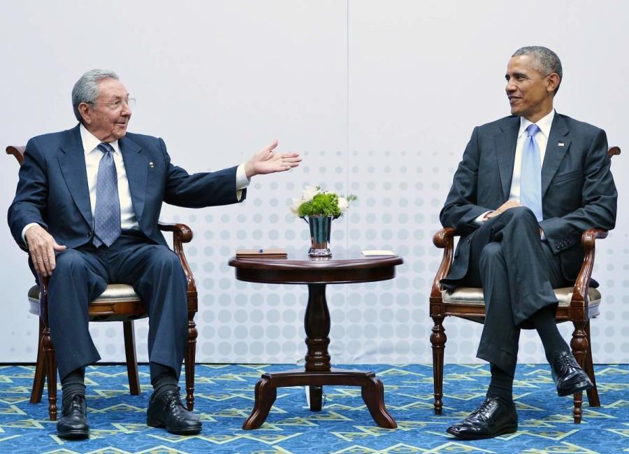 Cubas+President+Raul+Castro+%28L%29+speaks+during+a+meeting+with+US+President+Barack+Obama+on+the+sidelines+of+the+Summit+of+the+Americas+at+the+ATLAPA+Convention+center+on+April+11%2C+2015+in+Panama+City.+AFP+PHOTO%2FMANDEL+NGAN++++++++%28Photo+credit+should+read+MANDEL+NGAN%2FAFP%2FGetty+Images%29