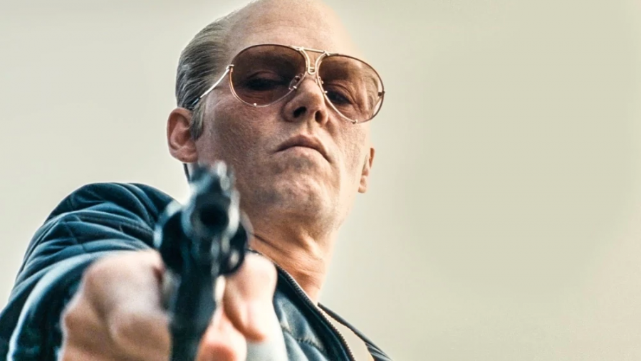 Johnny Depp takes a promotional picture as his crime lord character James “Whitey” Bulger. Achieving good scores across the board, this harkening back to the classic gangster movies of the past hit theaters on Sept. 18 2015. The dark and character driven film easily kept watchers engaged for its two hour and two minute running time.
