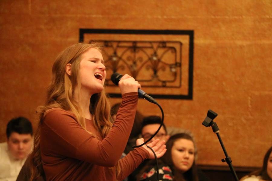 Belting out her solo rendition of Etta James At Last, Chloe Voeller, 11, was one of 24 student performances at Backstop Bar & Grill Tuesday night in Canby. Ensembles and student soloists were joined by professional musicians who provided the backing music for the performances.