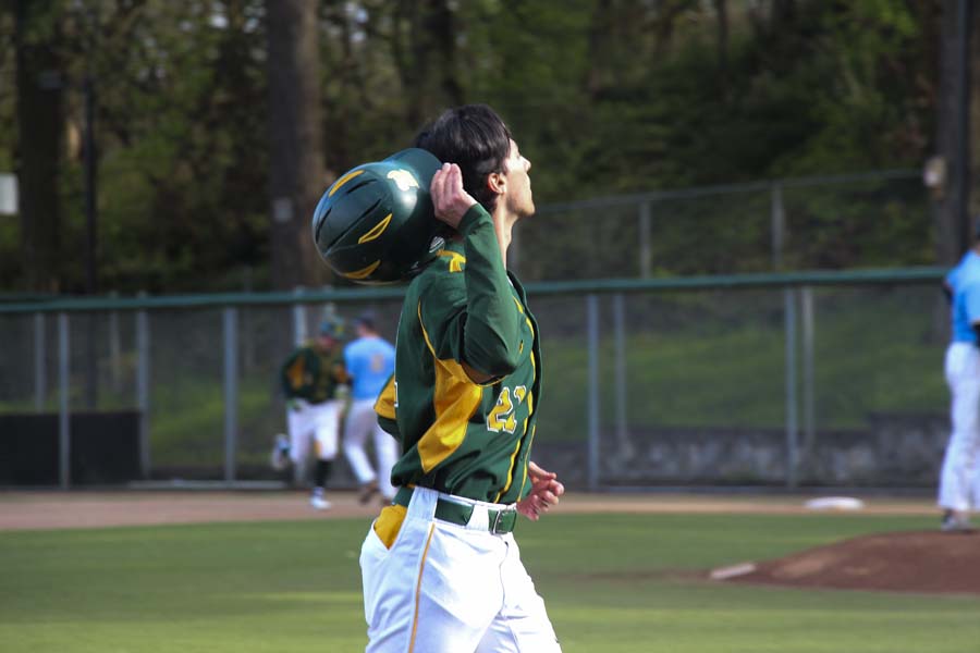 The+varsity+baseball+players+geared+up+to+face+Lakeridge+High+School+on+Monday+evening%2C+April+17%2C+at+home.+This+is+the+fourteenth+game+of+their+season.+West+Linn+ended+the+game+with+a+win+%287-3%29+defeating+Lakeridge.+In+between+plays%2C+many+of+the+players+basked+in+the+sunlight+and+cooled+off.+++%0A%0A