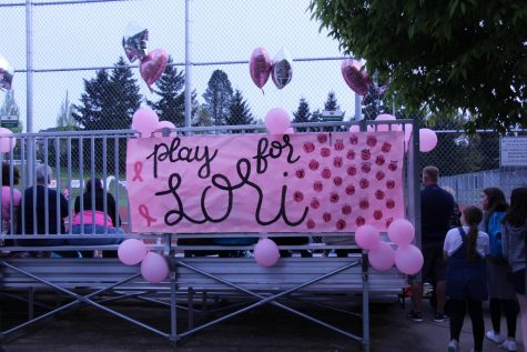 Greeting fans, a “Play for Lori” banner at the Rosemont Ridge Middle School announces the team’s efforts to support local cancer survivors. 