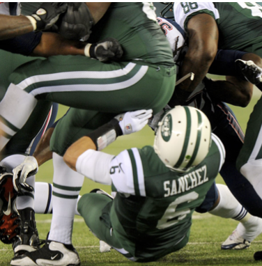 Quarterback Mark Sanchez fumbles the ball off of Brandon Moore’s bottom on 2012 Thanksgiving night. This play is renowned for being called “The Butt Fumble.”
