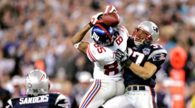 David Tyree (85) performs the “helmet catch” to help defeat the previously undefeated New England Patriots in Super Bowl XLII.