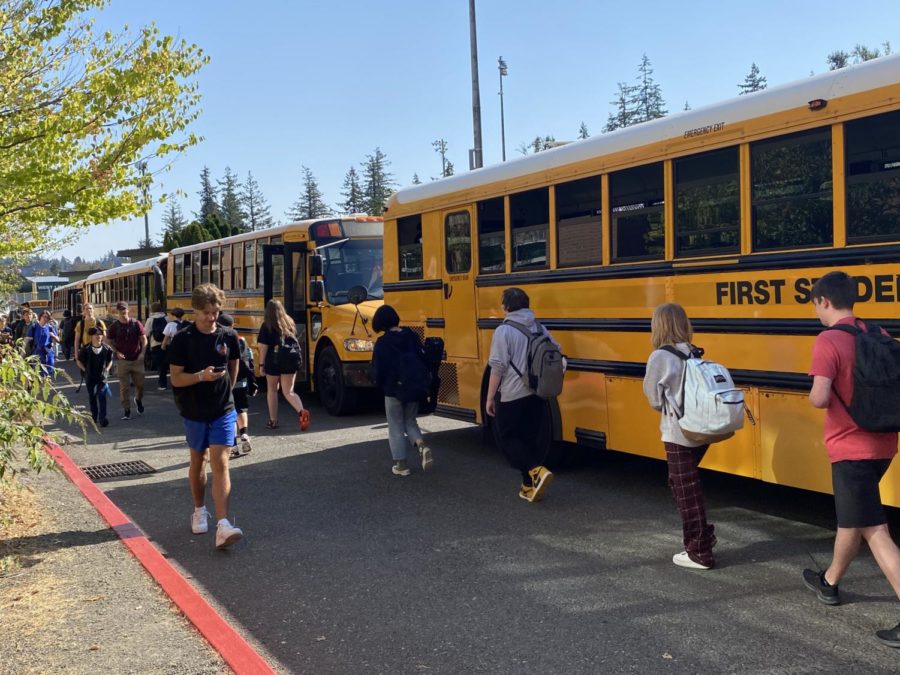 Students+heading+to+their+buses+after+school%2C+released+at+3.