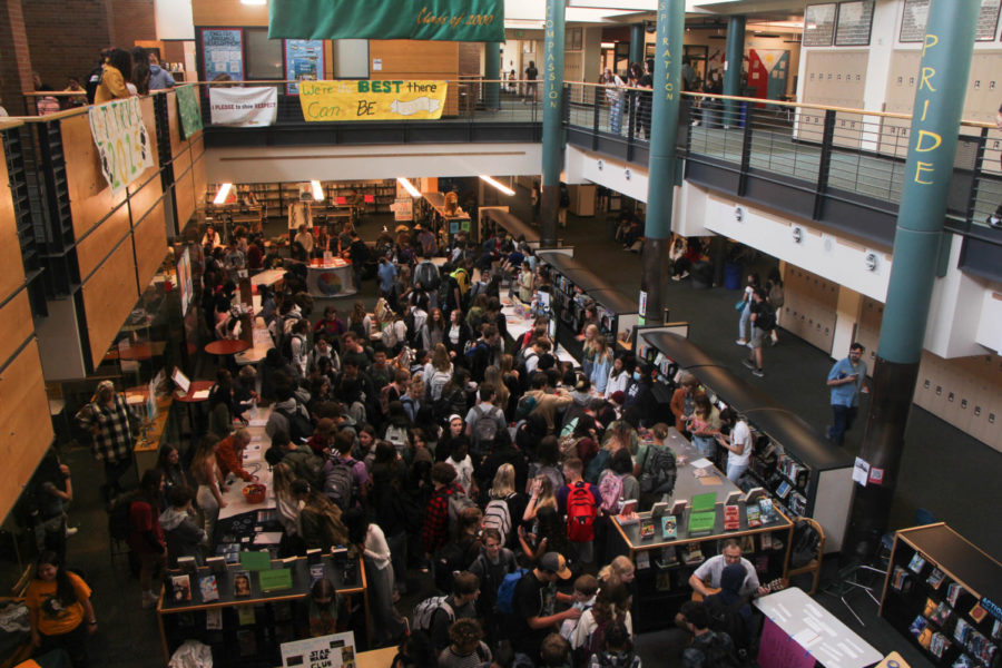 From the balcony, the club fair can be seen buzzing with activity.