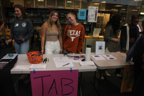 Teen Advisory Board leaders Lily Hobi, senior, and Holly Pearce, junior, gave out candy at their Club Fair table. 