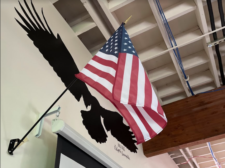 There are flags mounted on the walls of each classroom, allowing students to recite the pledge if they choose to.