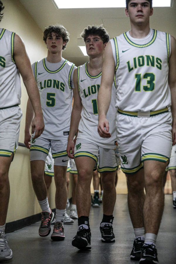 The team goes through the tunnel, preparing to face Jesuit, on Jan 13. They entered the game as the top team in the nation, according to USA Today Sports.