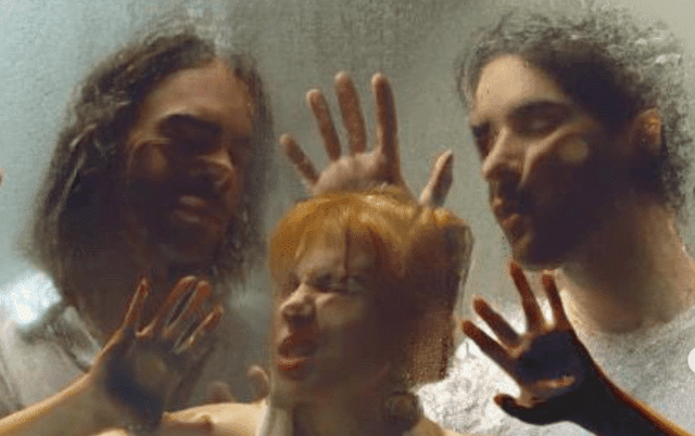 Taylor York(left), Hayley Williams(middle) and Zac Farro(right) are featured on the album cover of This is Why