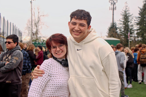 Amelia Deckert and Jonathan Garcia pose for a photo after sharing words about the recent school shooting and hold a moment of silence in honor of the victims. 