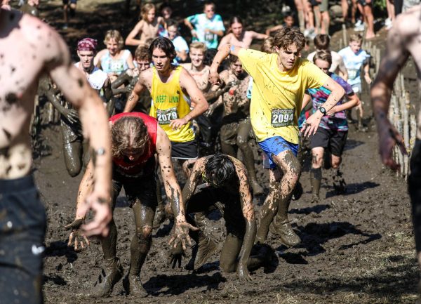 Stampede. Competitors from different schools try to gain a distant advantage from one another, before being taken down by the mud. 