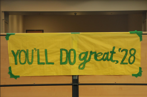 Above the library, posters for each grade level made by ASB hang over porches.