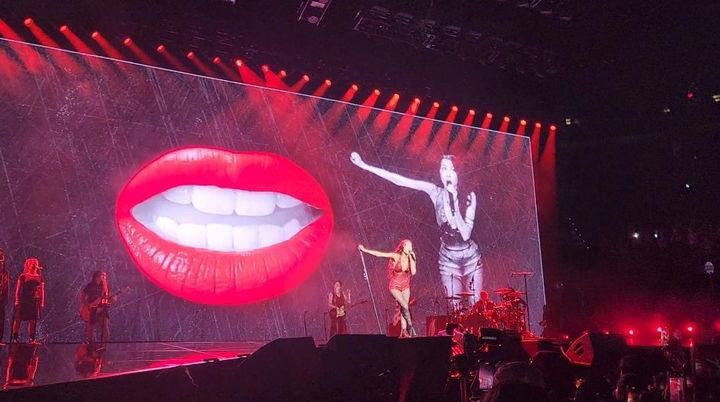 Olivia Rodrigo performs at the Moda Center on Aug. 10, 2024. Behind her a screen displays visuals and live footage, acting as a backdrop while she performs. Photo courtesy of Olivia Burden.