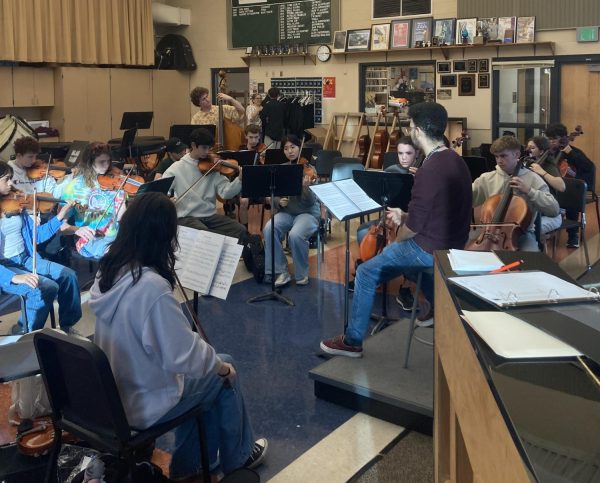 Slaughter teaches the orchestra class. Photo courtesy of Emily Pierce