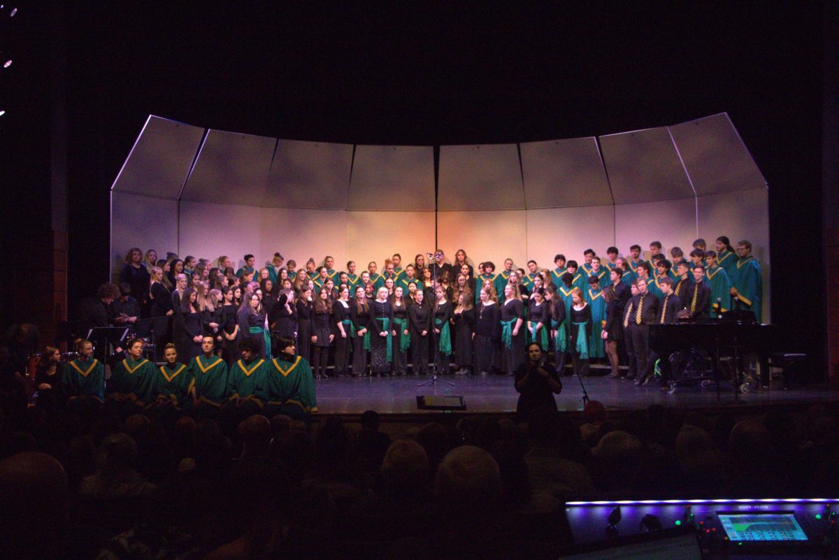 Gather ‘round. Before the choir sings the final song, Kubitschek talks about the backstory to the lyrics. “Singing with everyone is always such a blast, especially when we get to do big songs like the water fountain, like all the group fires,” Olson said.