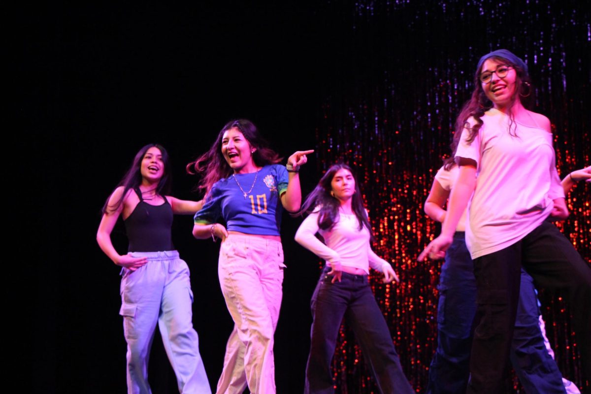 Feel the beat. Members of the Latin Student Union (LSU) perform a choreographed dance routine to two different songs. LSU was the reigning champion of last year’s Clubs Got Talent and was the first to perform at this year’s competition. Mariel Garcia, senior, performed with the group for the second year in a row. She also joined the Lions dance team this year. “I can help people clean up or find alternative moves for them if they don’t feel like they can do something, and help with the rhythm a bit,” Garcia said.