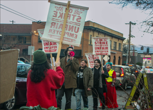 New Seasons employees chant, "Safeway, Market of choice, are all better than New Seasons, shop there instead" while protesting in Sellwood.