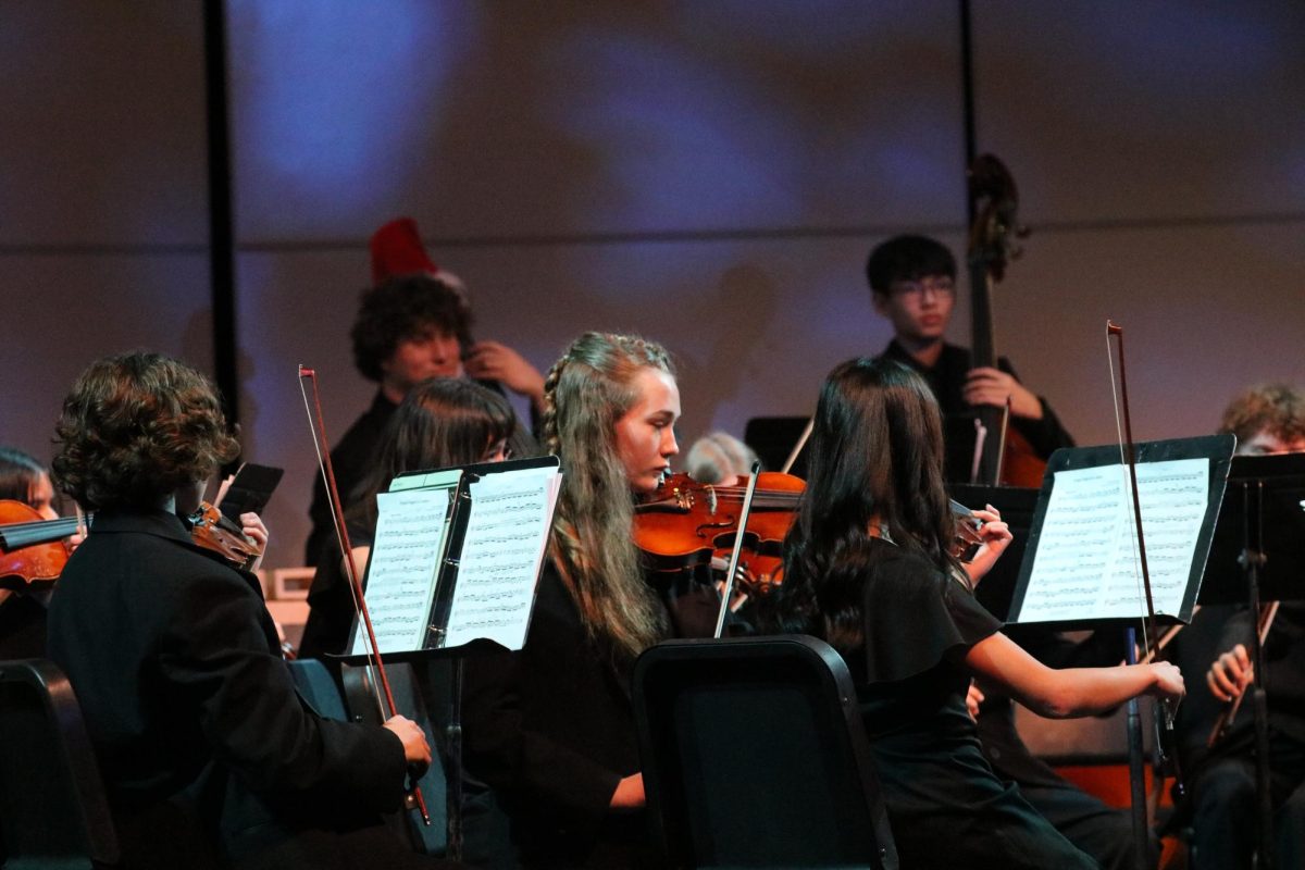 Orchestra performs during their concert the week before winter break.