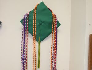 Graduation caps and cords students achieve at graduation. 