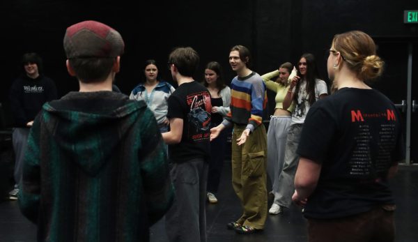 The WLHS Improv Troupe in rehearsal practicing the game Objection.